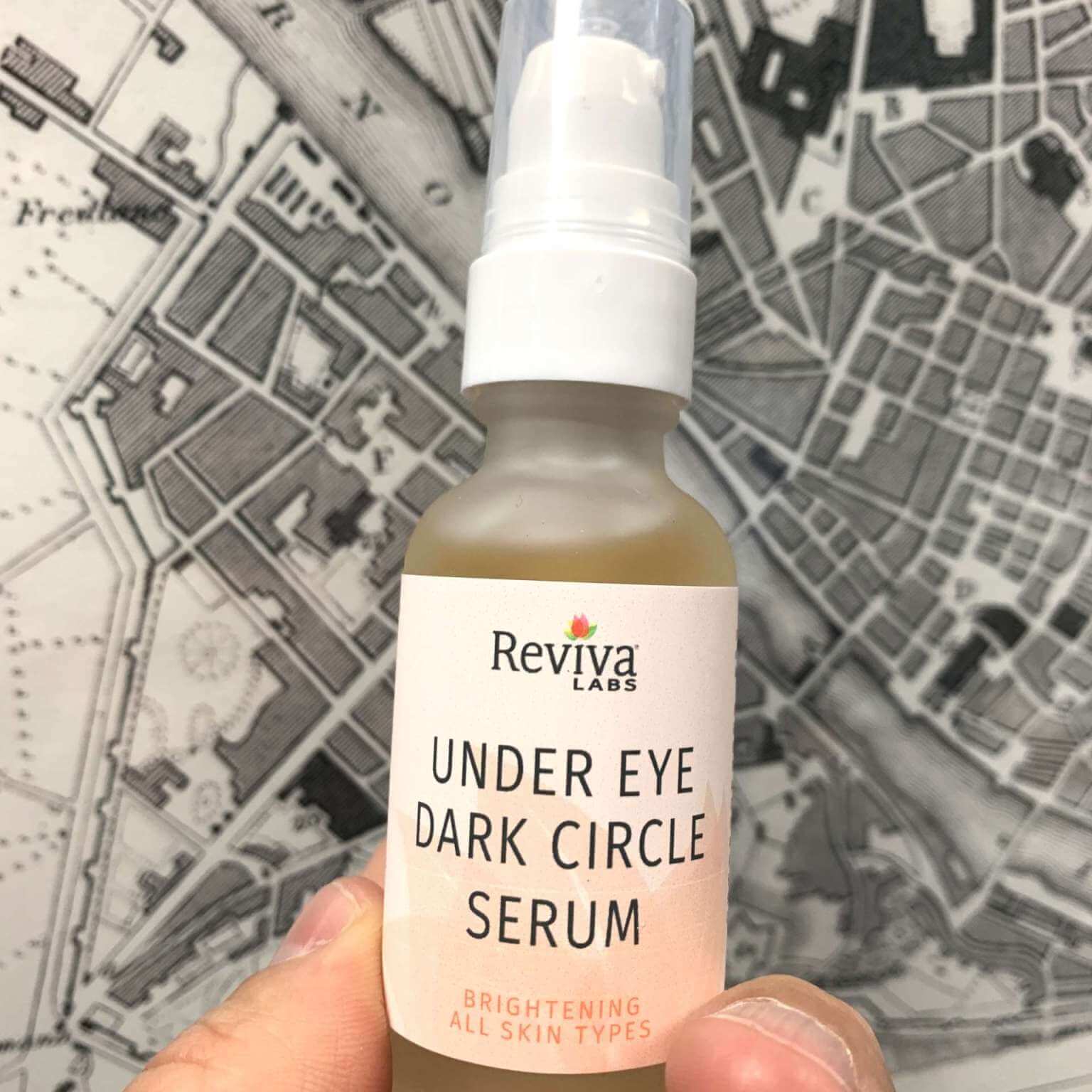 under eye dark circle serum infront of map