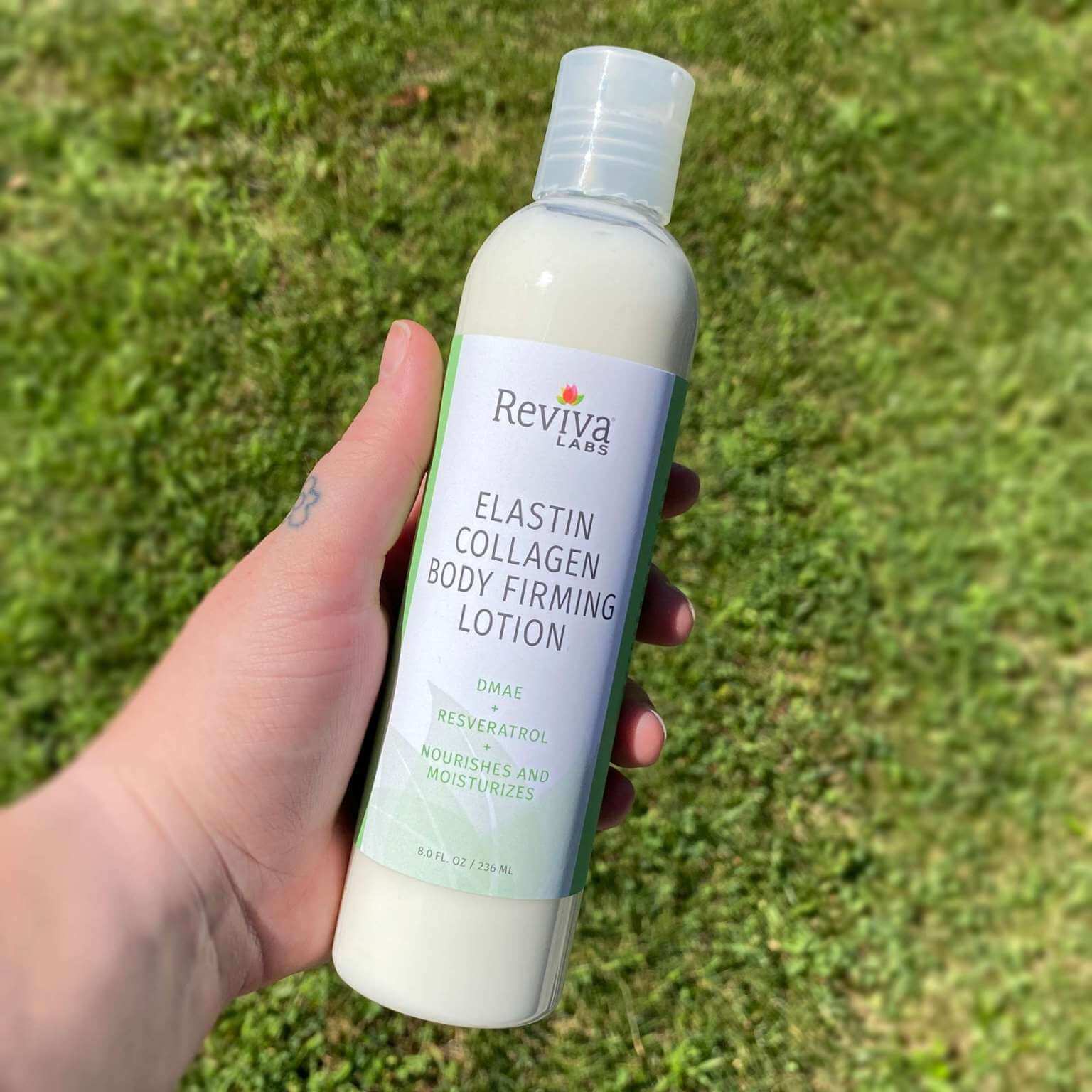 elastin collagen body lotion in hand