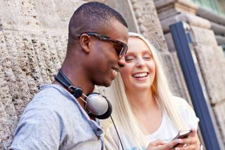 Girl with head phones and girl