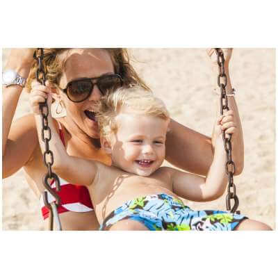 move and baby boy on swing