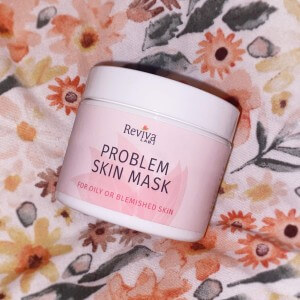 problem skin mask jar on flower