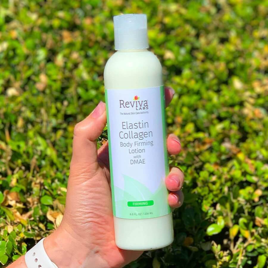 elastin collagen body lotion held in female hand