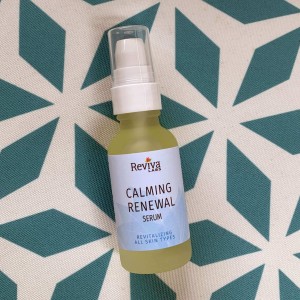 Calming Renewal Serum on pillow