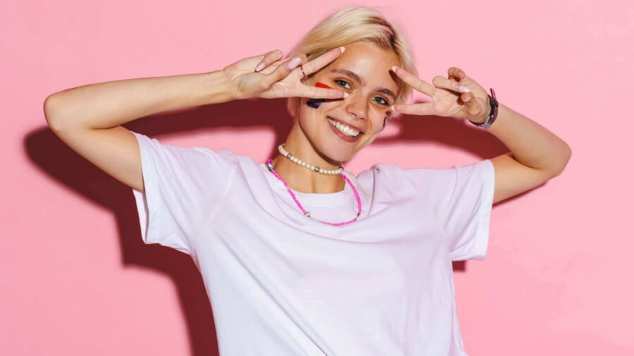 Young-smiling-blonde-female-in-white-t-shirt