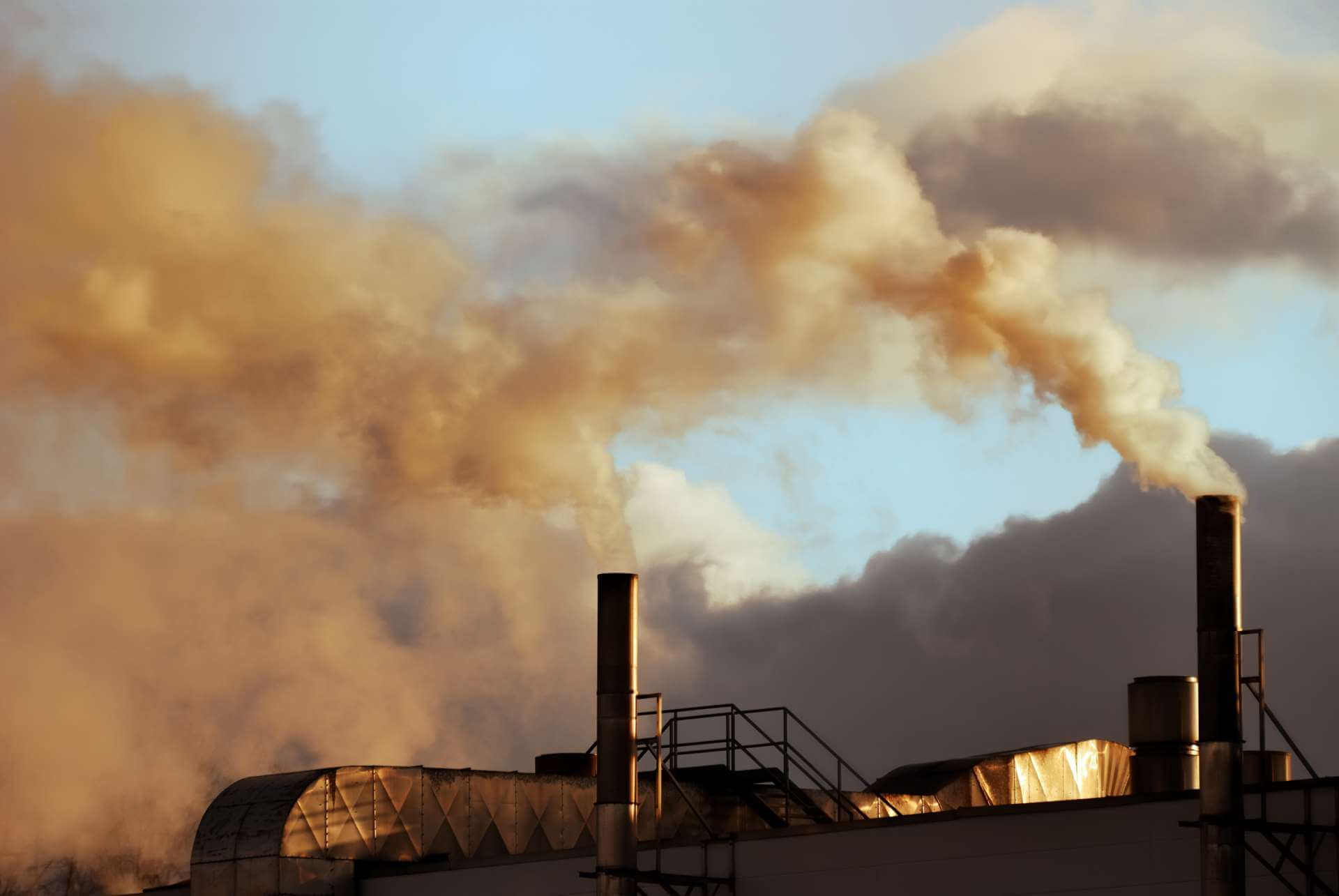 Factory spewing air pollution and smoke