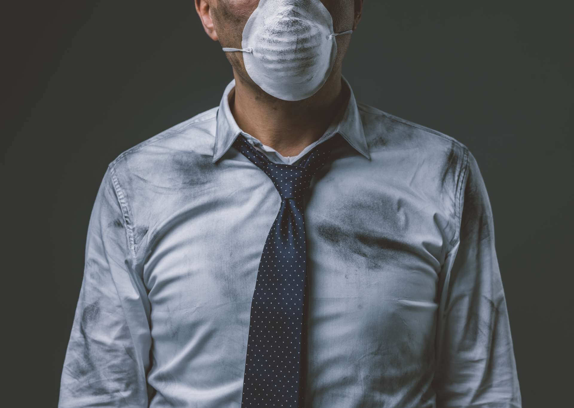 businessman-with-mask-and-air-pollution-2021-08-26-22-39-44-utc