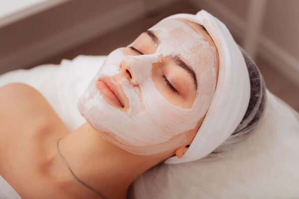 Exfoliating mask treatment at spa