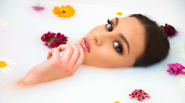 cleopatra female in milk bath with flowers