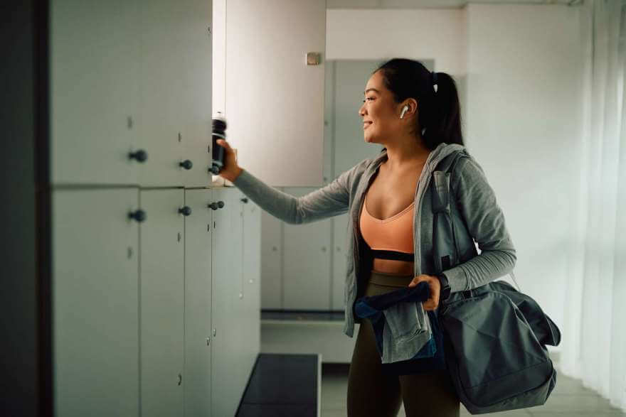 happy asian female athlete preparing for workout a 2022 11 23 18 00 23 utc