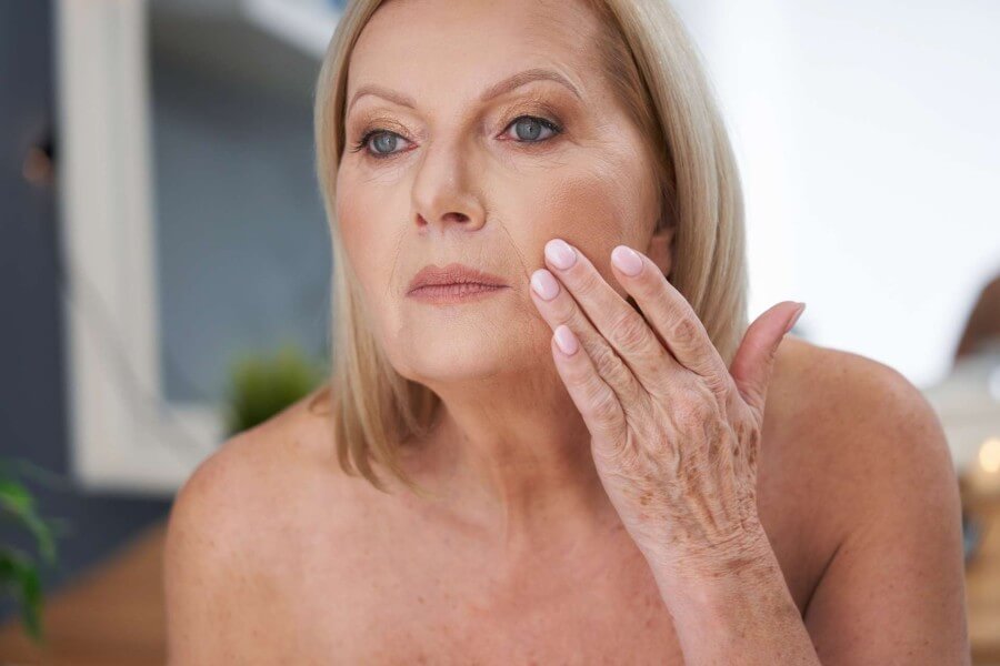 senior woman using anti wrinkle cream in the bathr 2022 05 13 01 36 30 utc