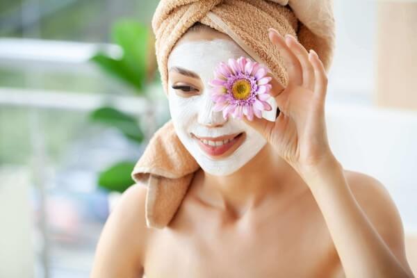 skin care woman with beautiful facial skin applyi 2023 06 21 07 33 04 utc