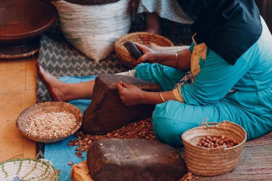 woman making argan oil by hand craft 2022 09 07 18 13 23 utc