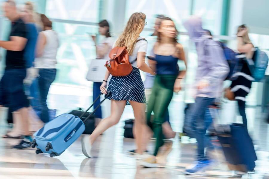 young stylish woman rushing to the departure gate 2022 11 14 05 05 07 utc