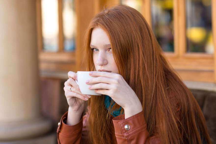 girl drinking coffee in outdoor cafe 2021 08 26 18 19 35 utc