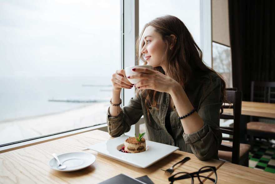 happy young beautiful lady sitting in cafe drinkin 2021 08 26 18 21 15 utc