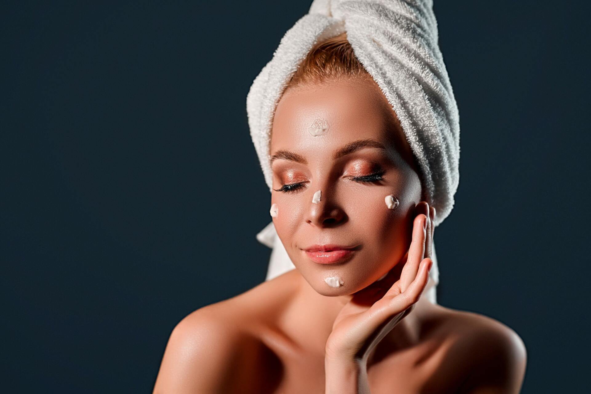 portrait of a young attractive woman with a towel on her head us