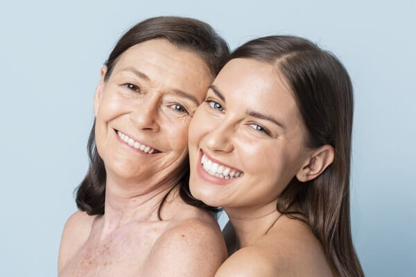 happy mother and daughter hugging