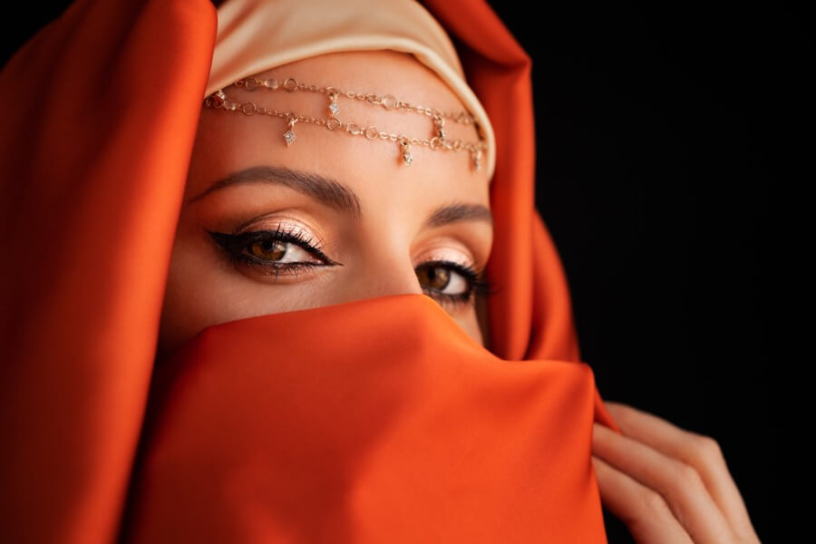 close up portrait of beauty young muslim woman in hijab looking at camera