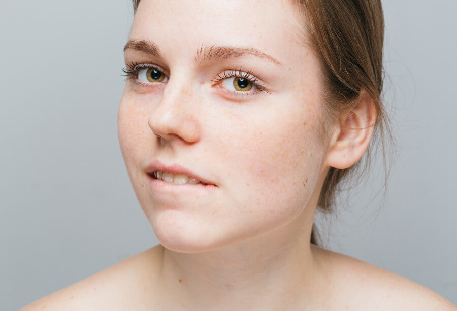 woman face close up beautiful smile healthy care