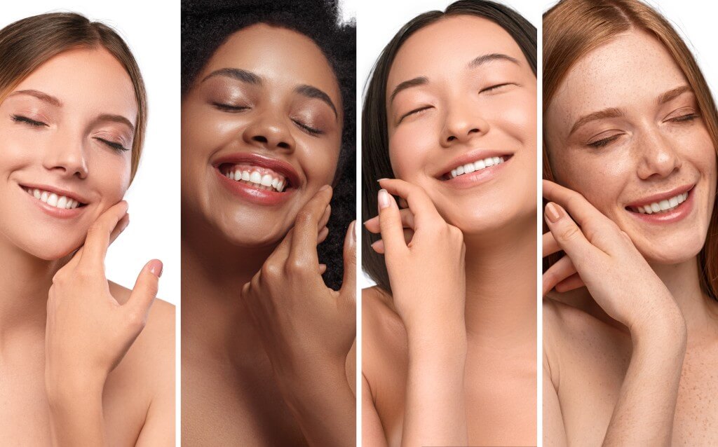 happy diverse women enjoying skin softness