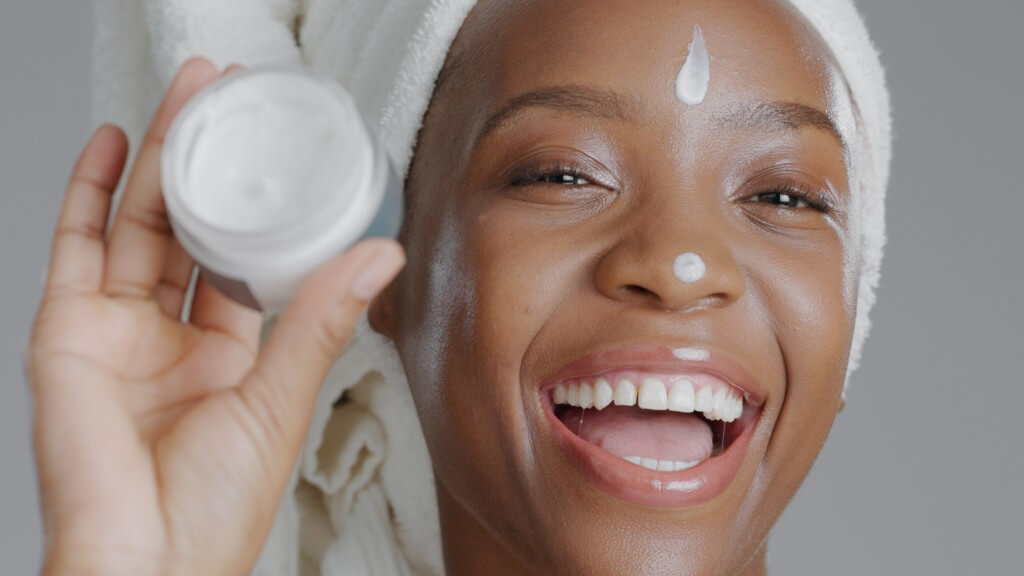 woman moisturizer and smile in portrait closeup f 2023 11 27 05 11 59 utc