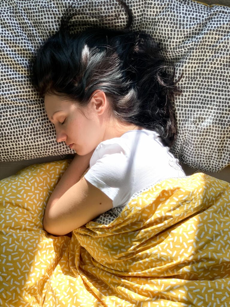 young millennial candid woman brunette is sleeping 2023 11 27 05 33 11 utc