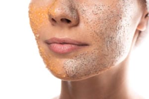 cropped view of young woman with scrub on face iso 2024 11 18 20 07 03 utc