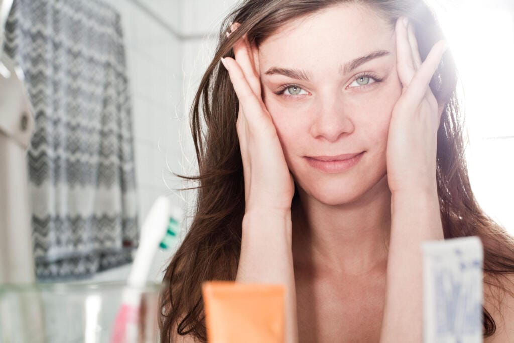 portrait of young woman looking at her mirror imag 2024 09 18 05 16 34 utc