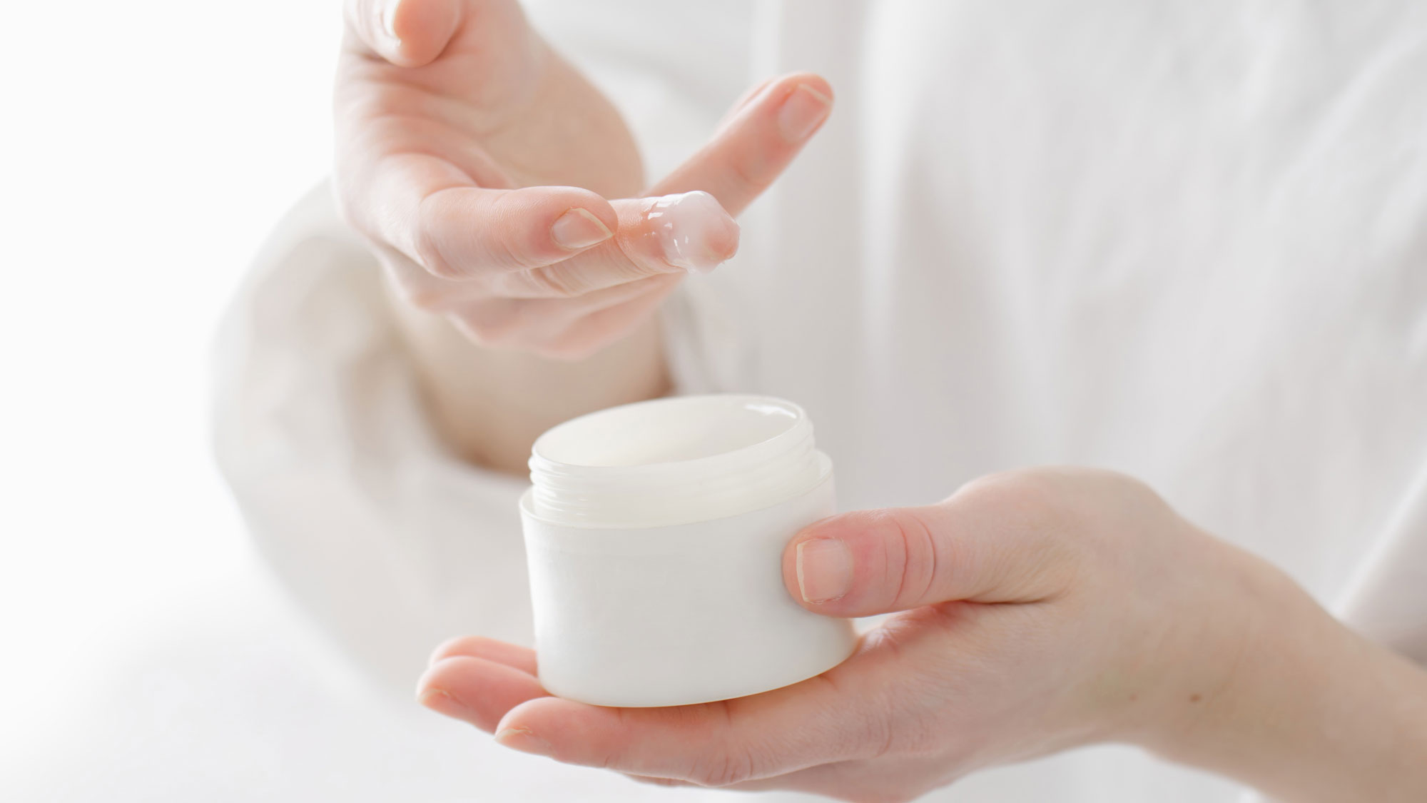 a woman applying skin care cream on her hands 2024 05 28 15 23 23 utc