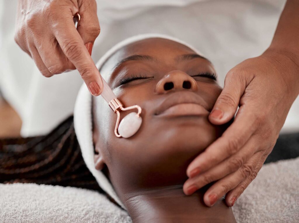 facial roller spa and black woman relax for massa 2023 11 27 05 11 29 utc