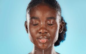 water skincare and face of a black woman in studi 2023 11 27 04 49 18 utc